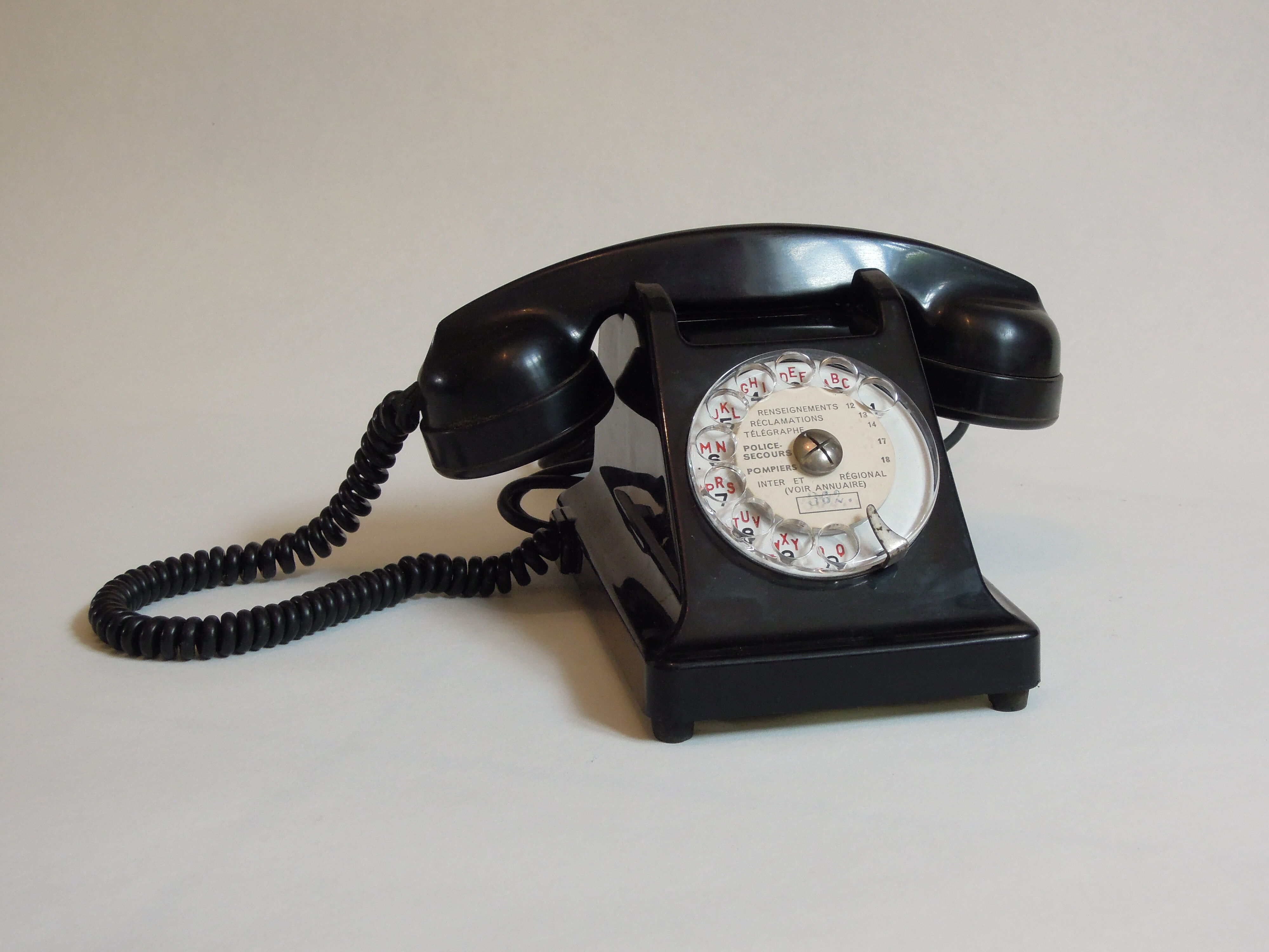 Ancient black bakelite  telephone