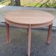 Renovated round extendable Scandinavian dining table in teak, 153cm.