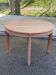 Renovated round extendable Scandinavian dining table in teak, 153cm.