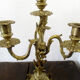 Pair of bronze candelabras and brass bobèches