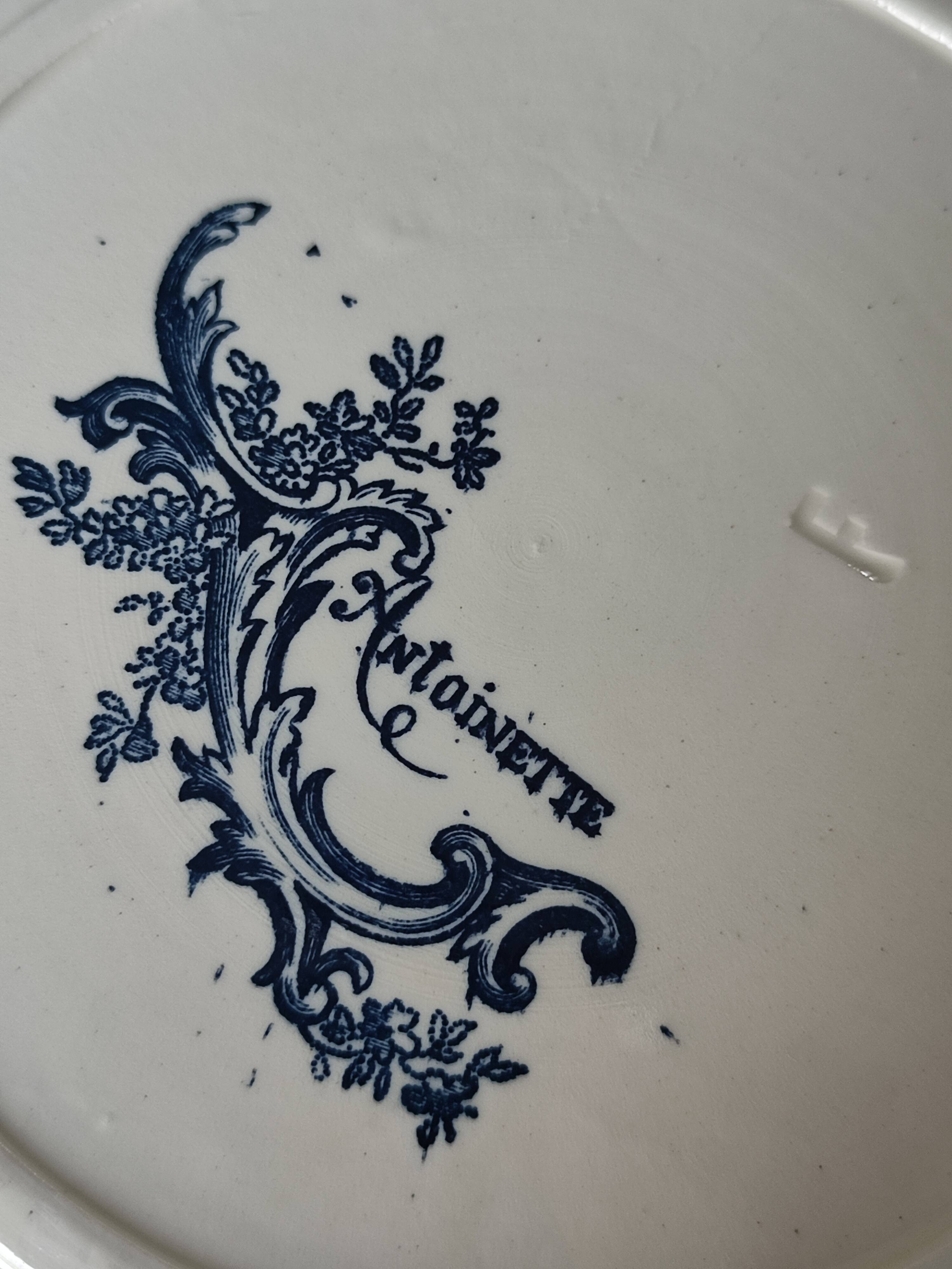 Set of nine antique earthenware, terracotta plates Salins, Antoinette