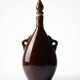 Vintage brown ceramic bottle, flask or canteen from the 1950s-60s.