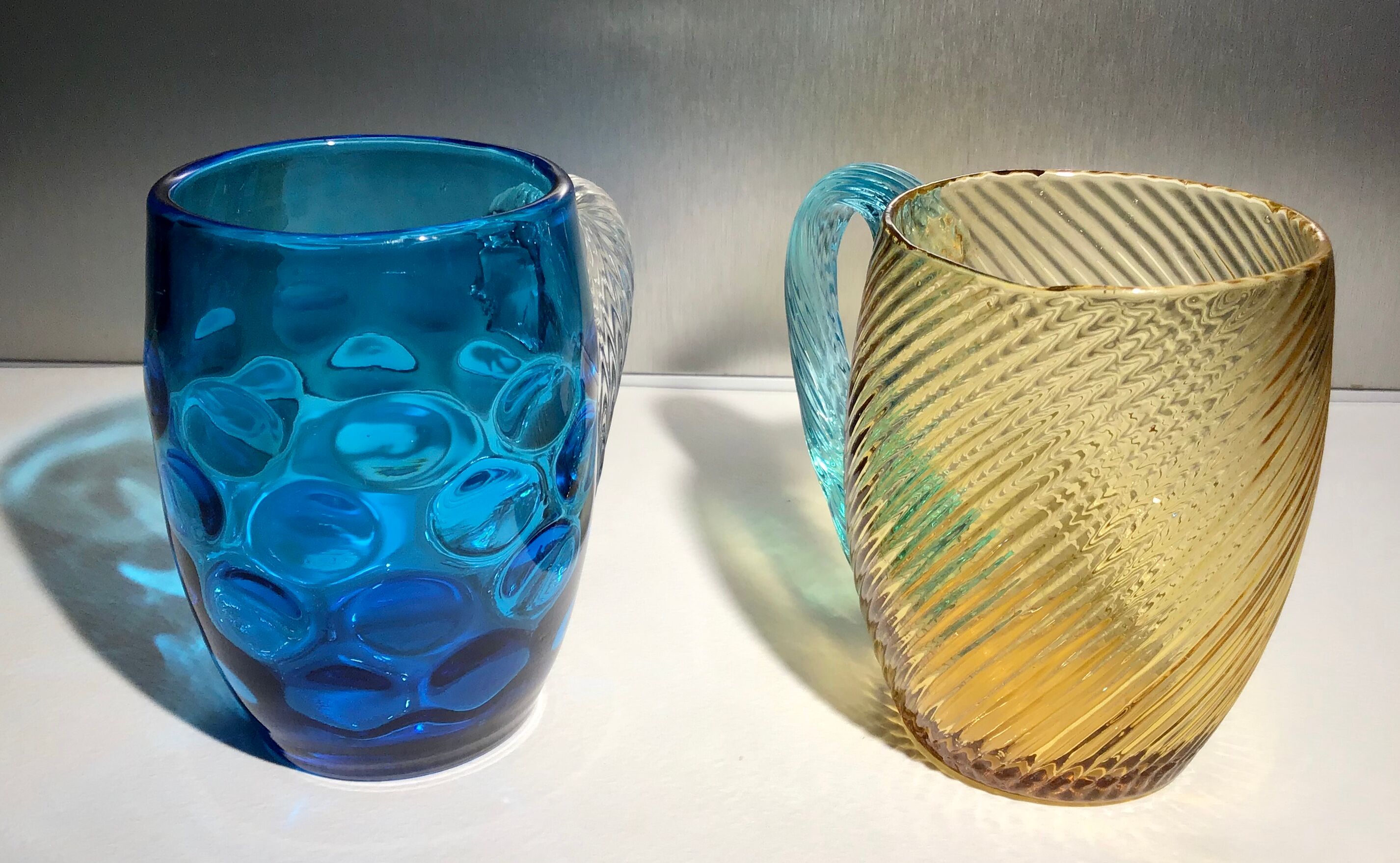 Two glass and crystal mugs, model of the Portieux crystal factory.