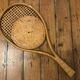 Vintage rattan tennis racket mirror