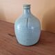 Vase, bouteille, soliflore en grès émaillé vert, Fred Ferry