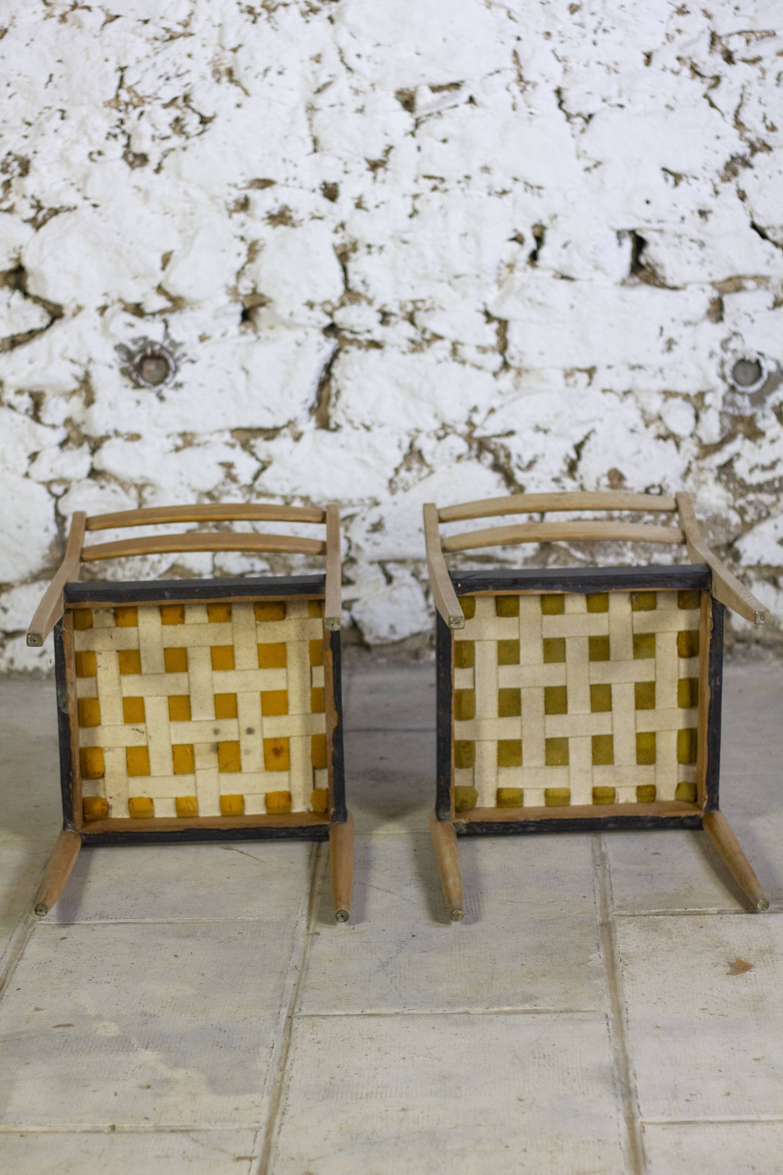Pair of Scandinavian chairs in teak and faux leather, 1960.