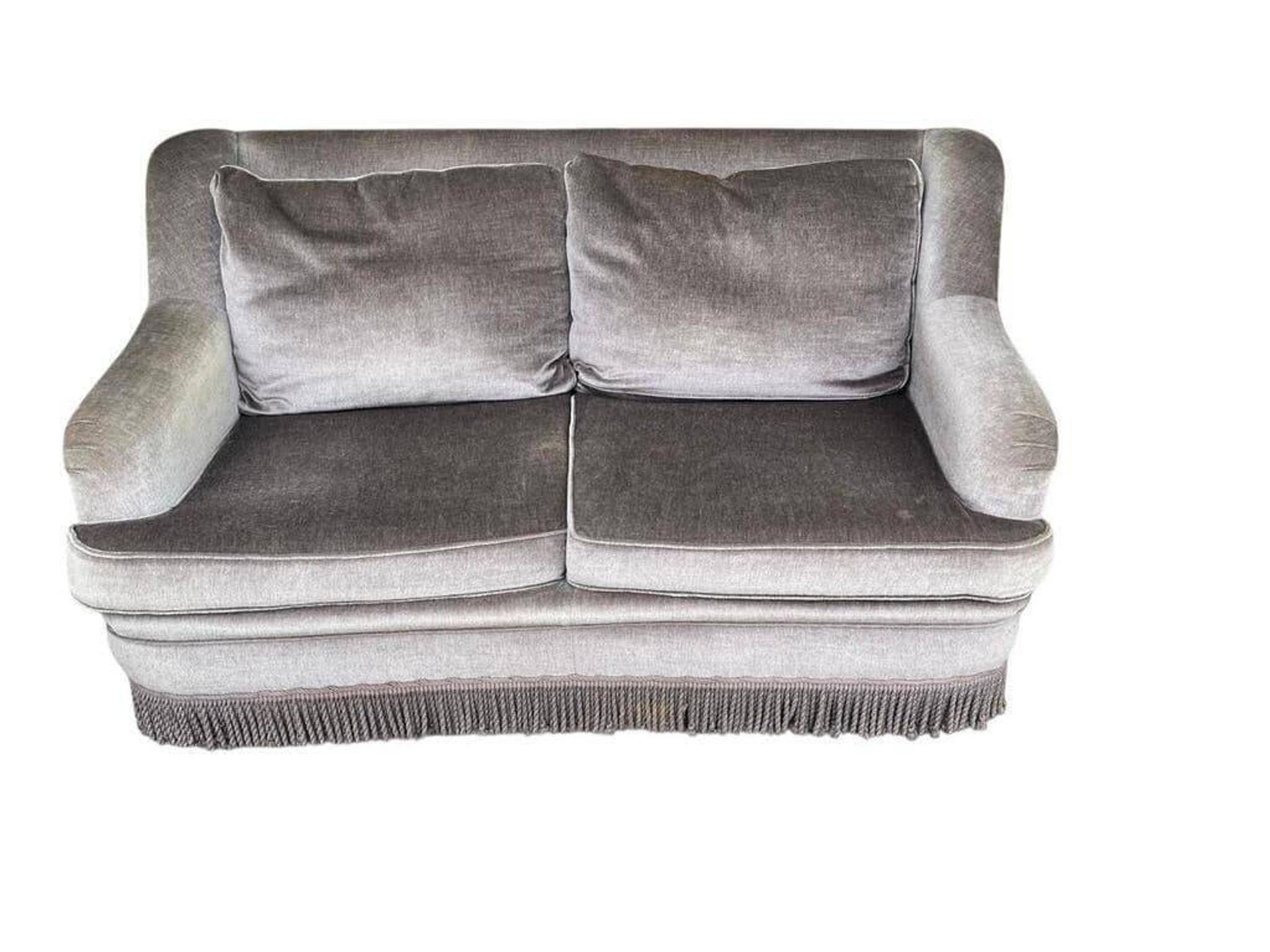 Vintage taupe two-seater armchair/sofa with fringes.