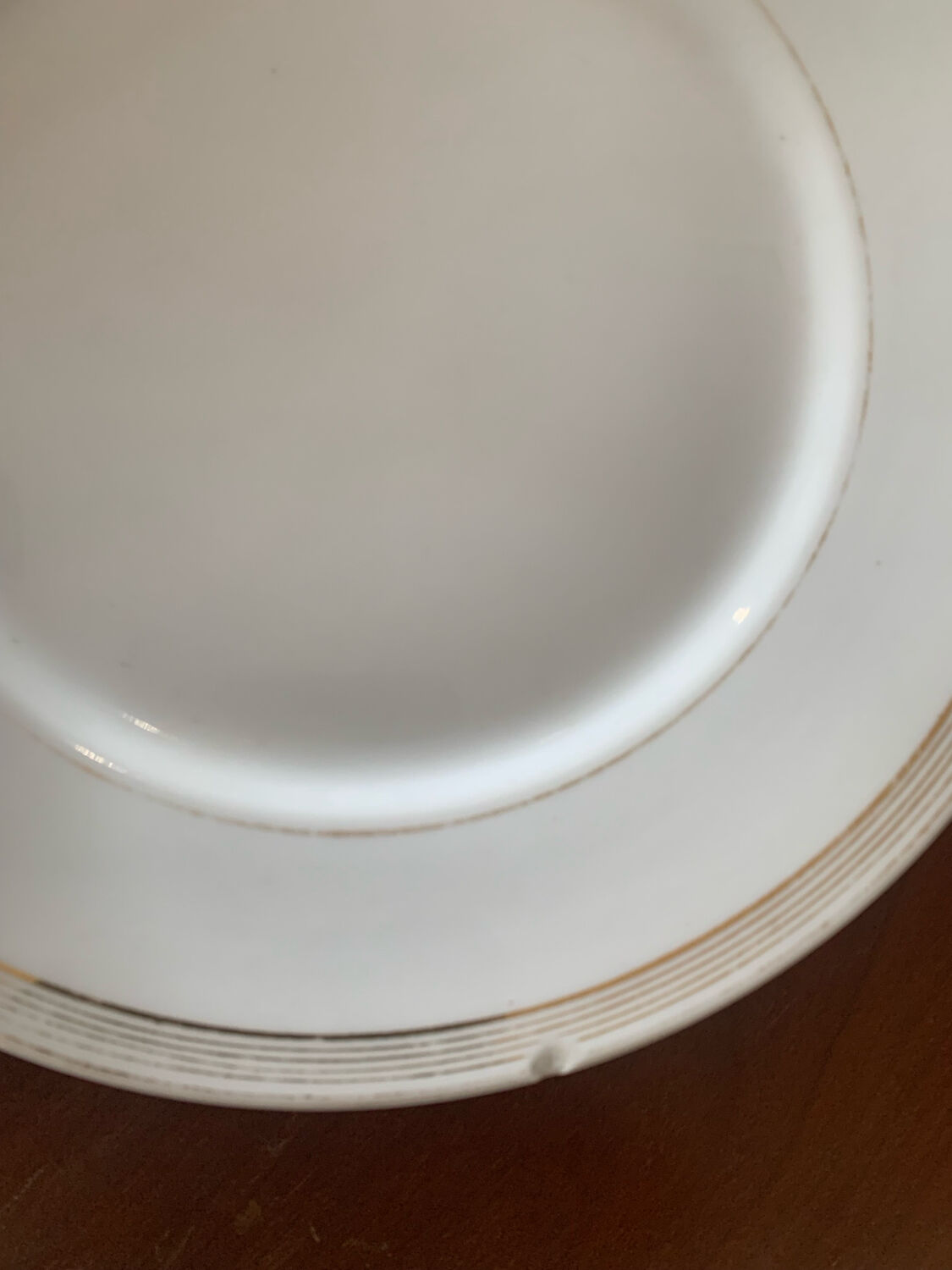 Lot of six flat plates, crockery, old white, gilded