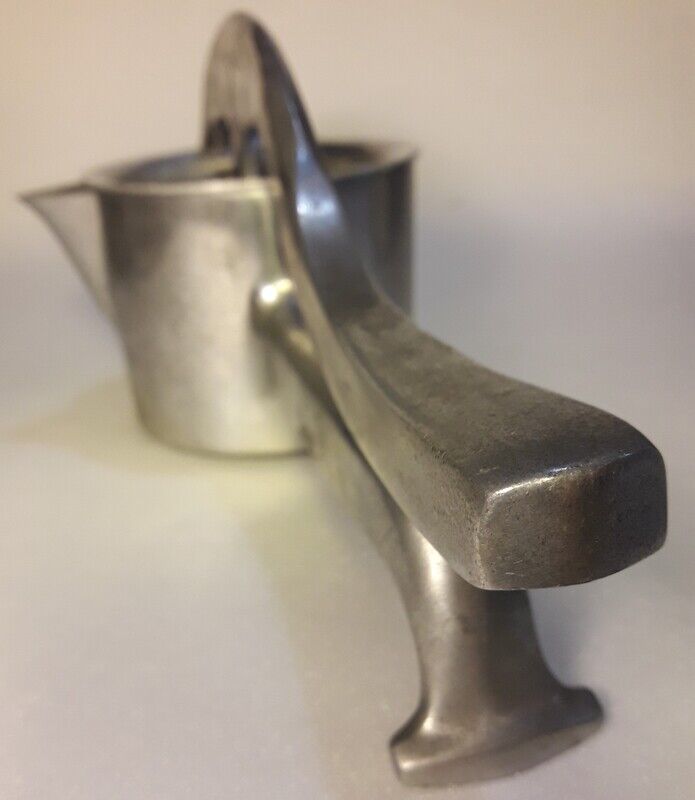 Vintage grapefruit metal citrus press