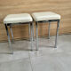 Pair of vintage 1980 chrome stools with white faux leather in very good condition.
