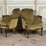 Pair of louis xv style armchairs in carved beech around 1920