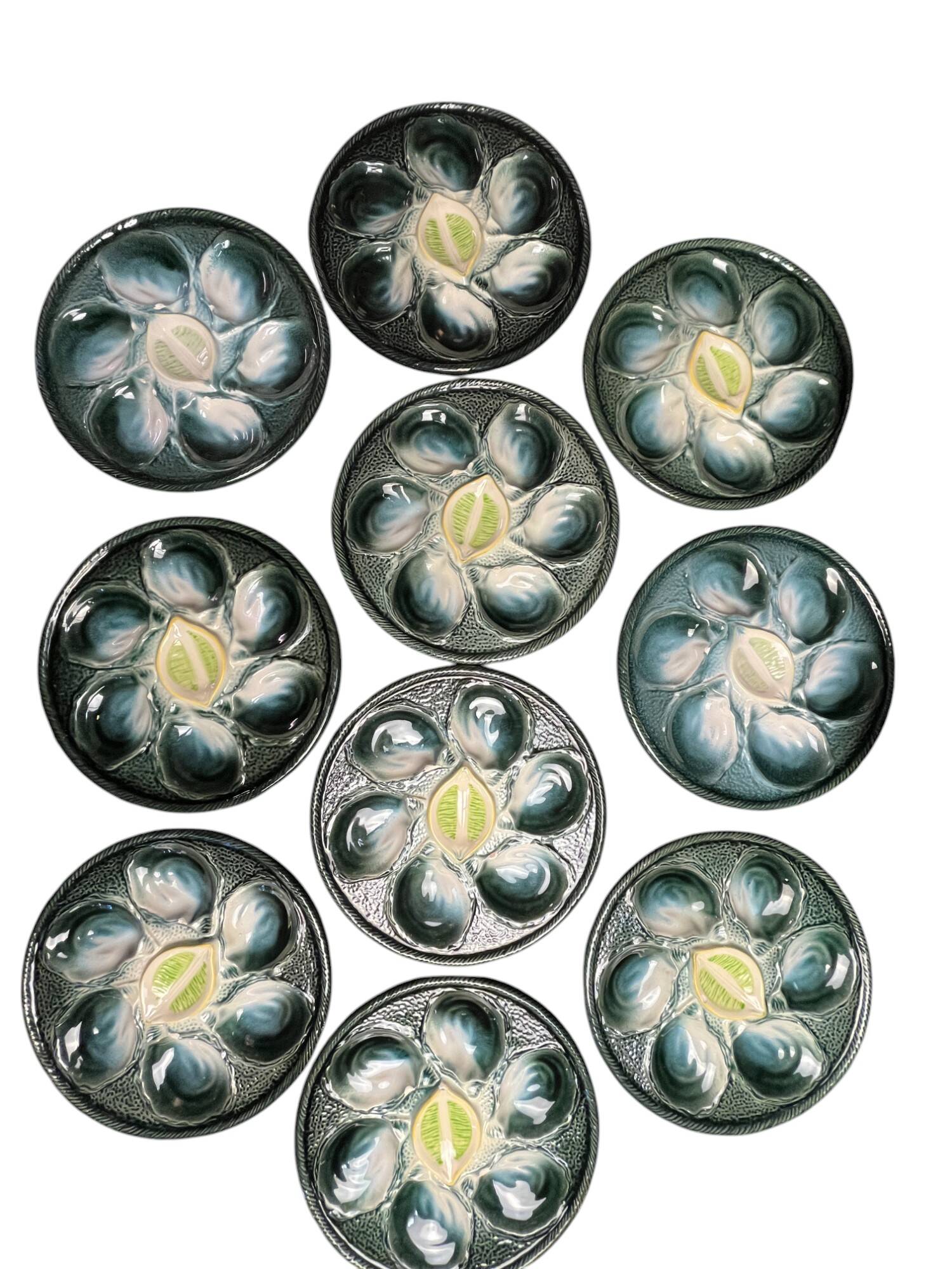 Set of 10 Saint Clément oyster barbotine plates circa 1940