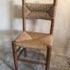 Brutalist vintage beech chair and mid-century straw