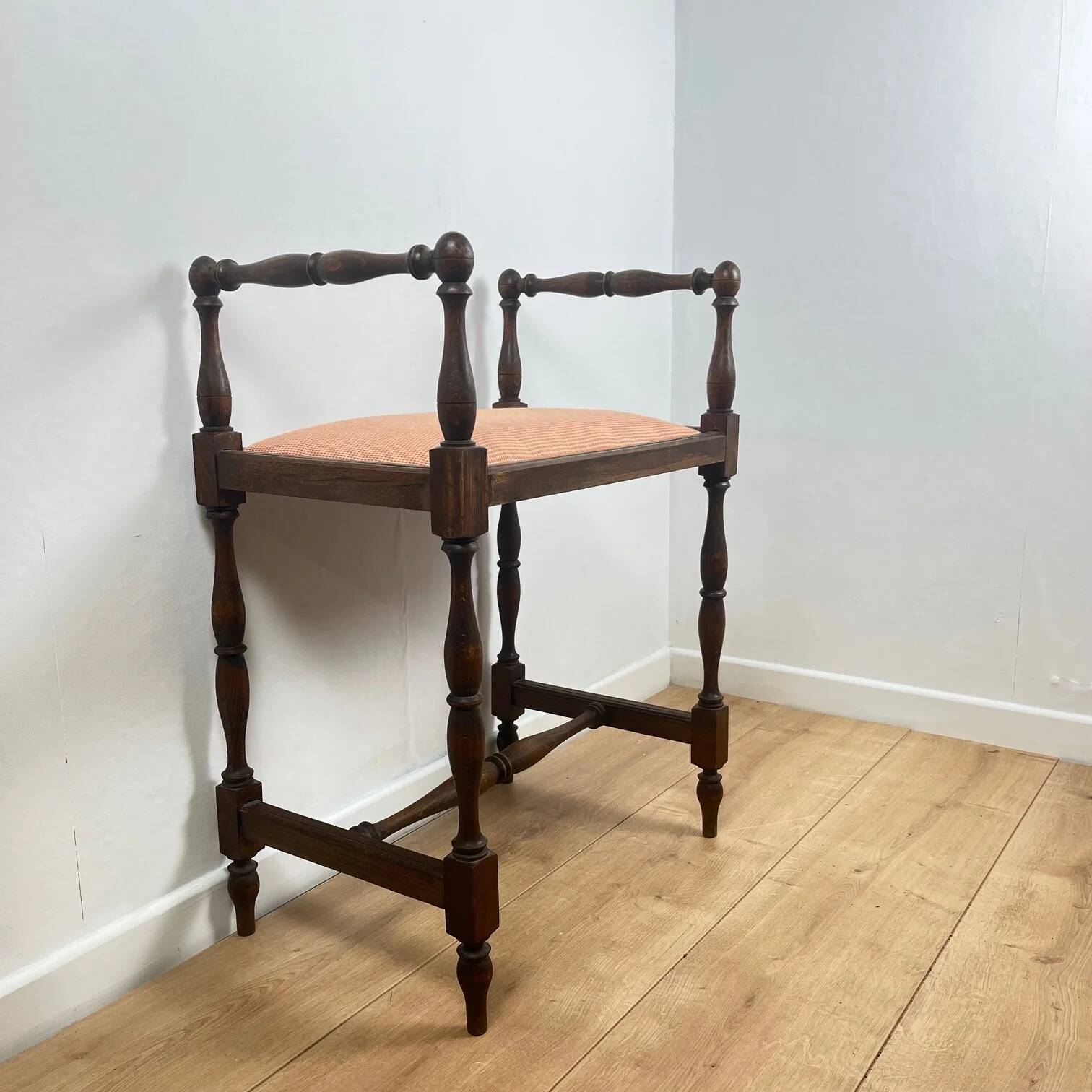 Small bench / stool in traditional English style, with side armrests.