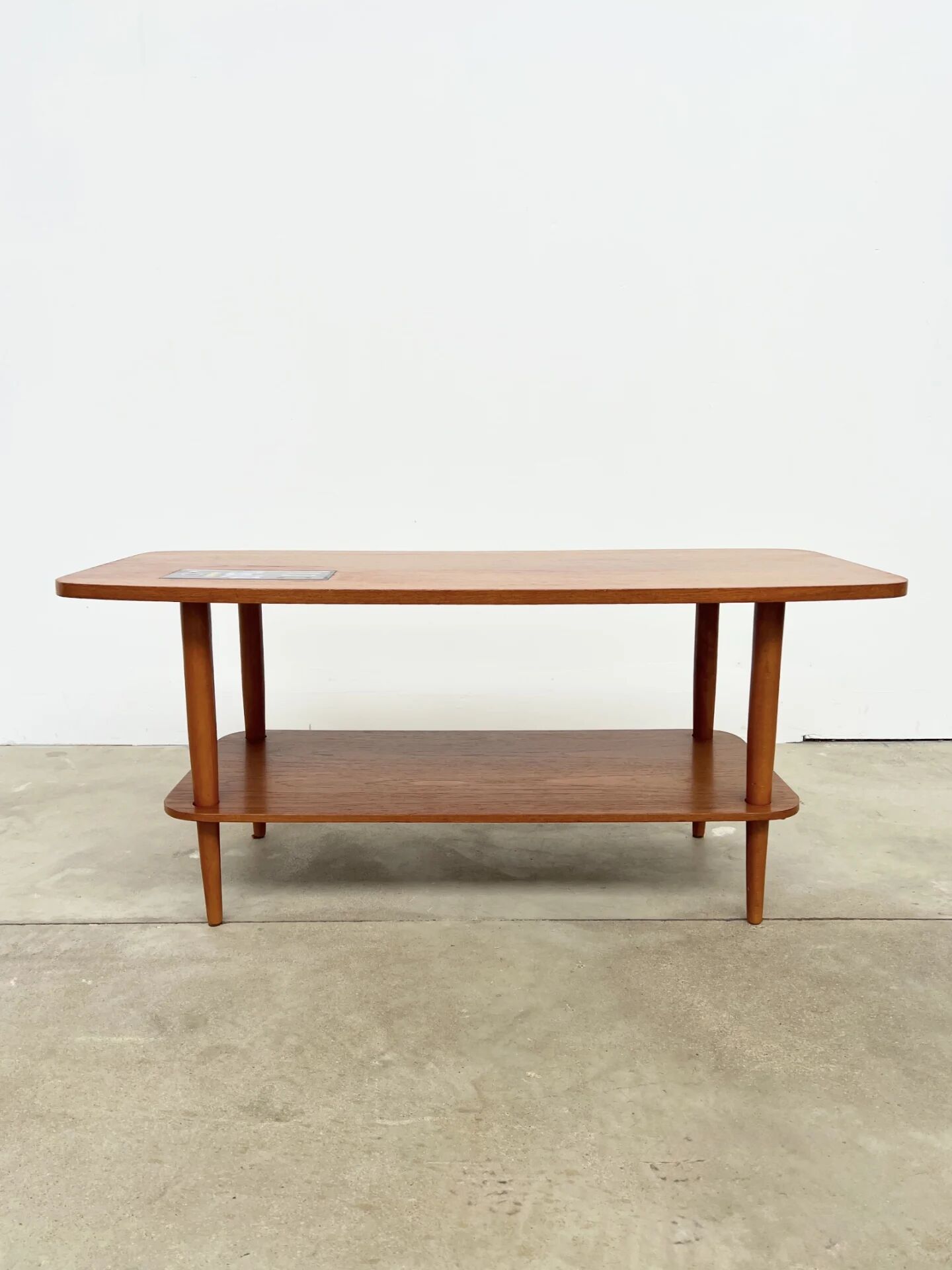 Teak coffee table with double top and ceramic insert — Scandinavian, 1960s