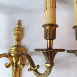 Pair of bronze wall sconces in Louis XVI style