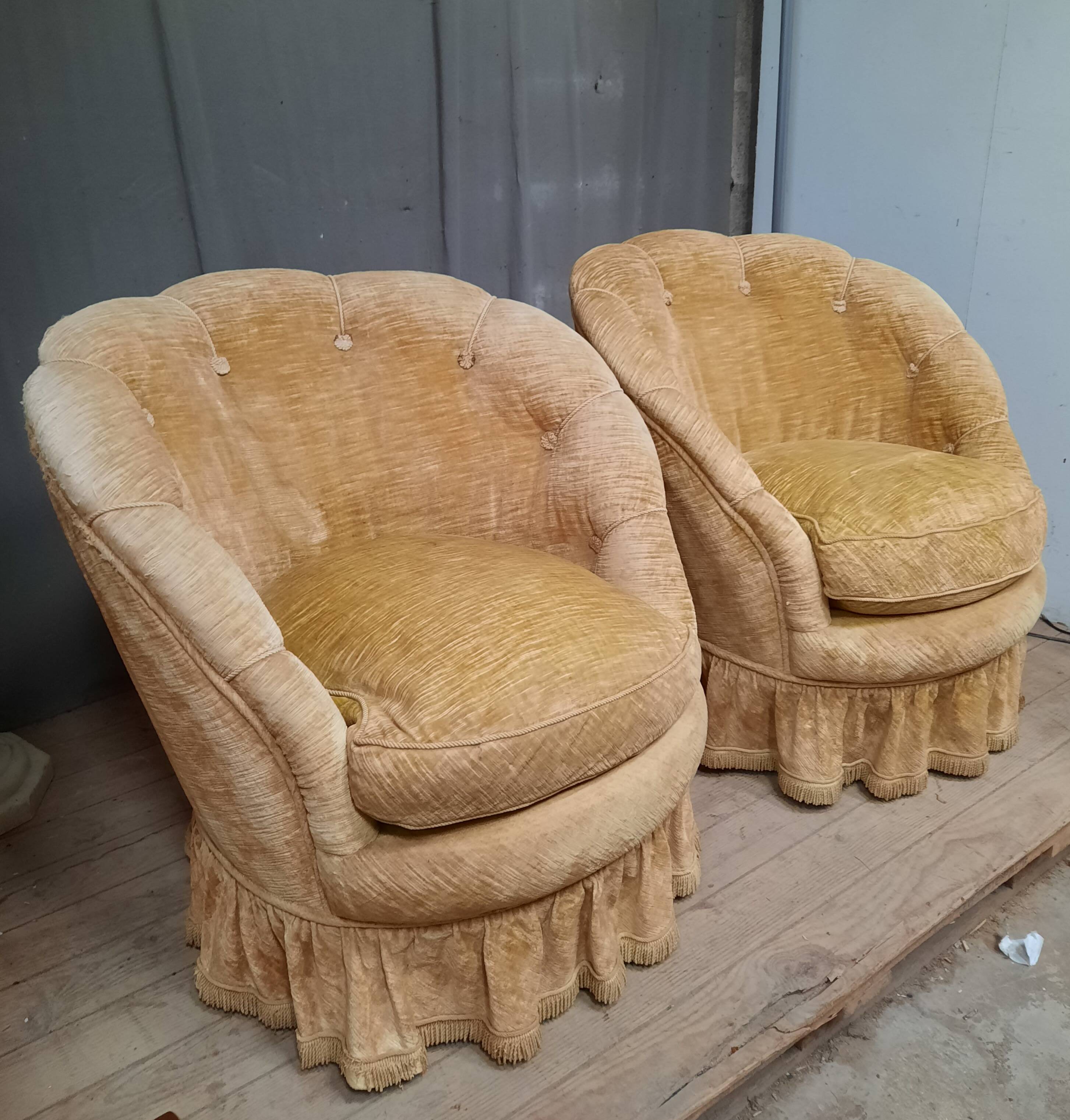 Pair of flared back toad armchairs