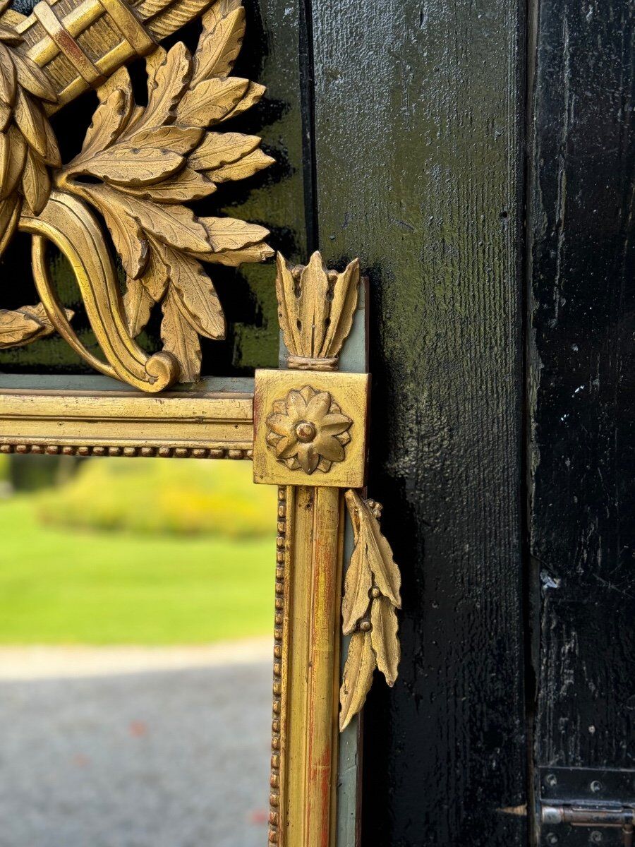 Louis XVI carved and gilded wood mirror, late 18th century