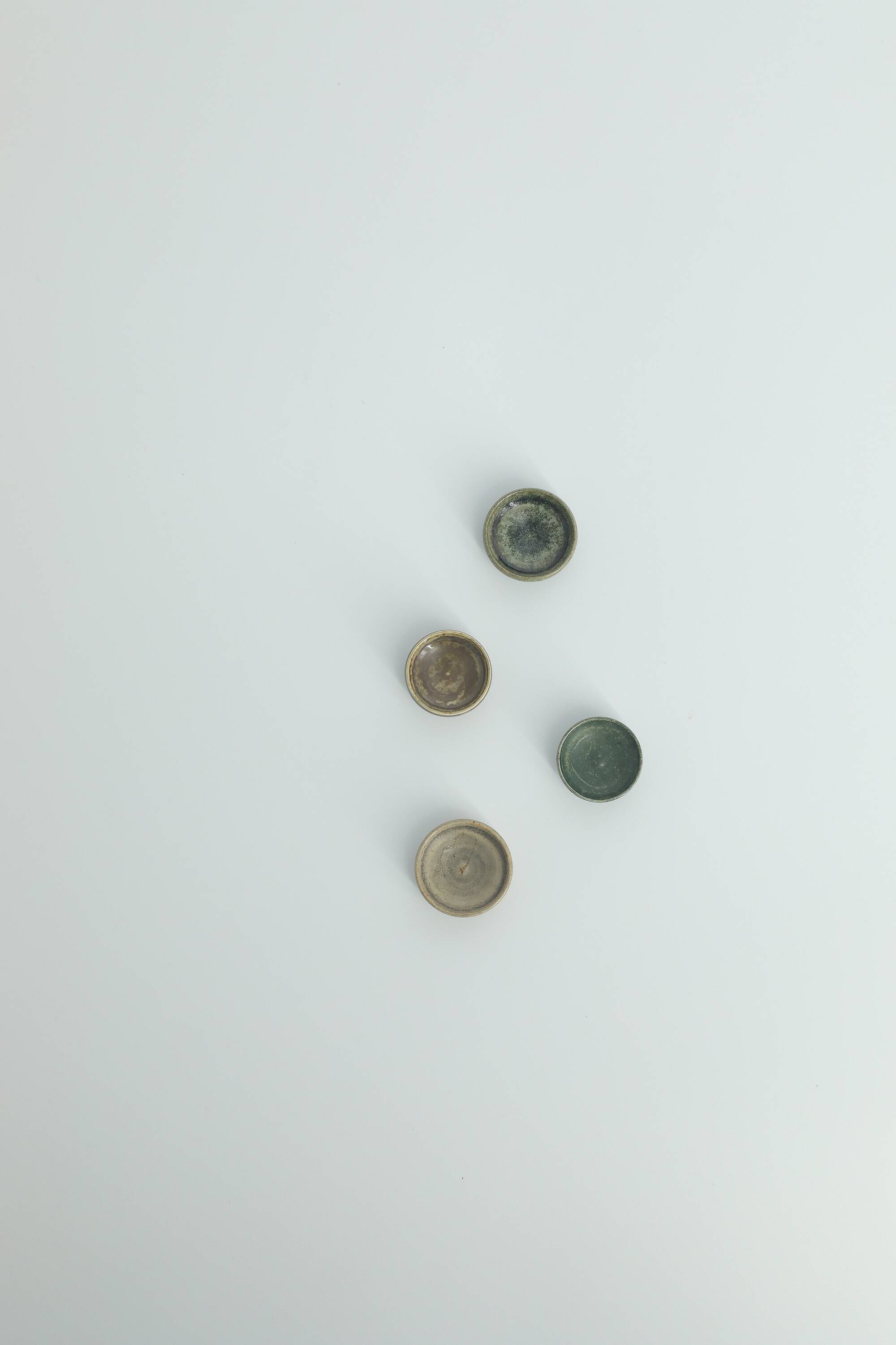 Set of 4 Scandinavian collection bowls in brown and green stoneware, mid-20th century.