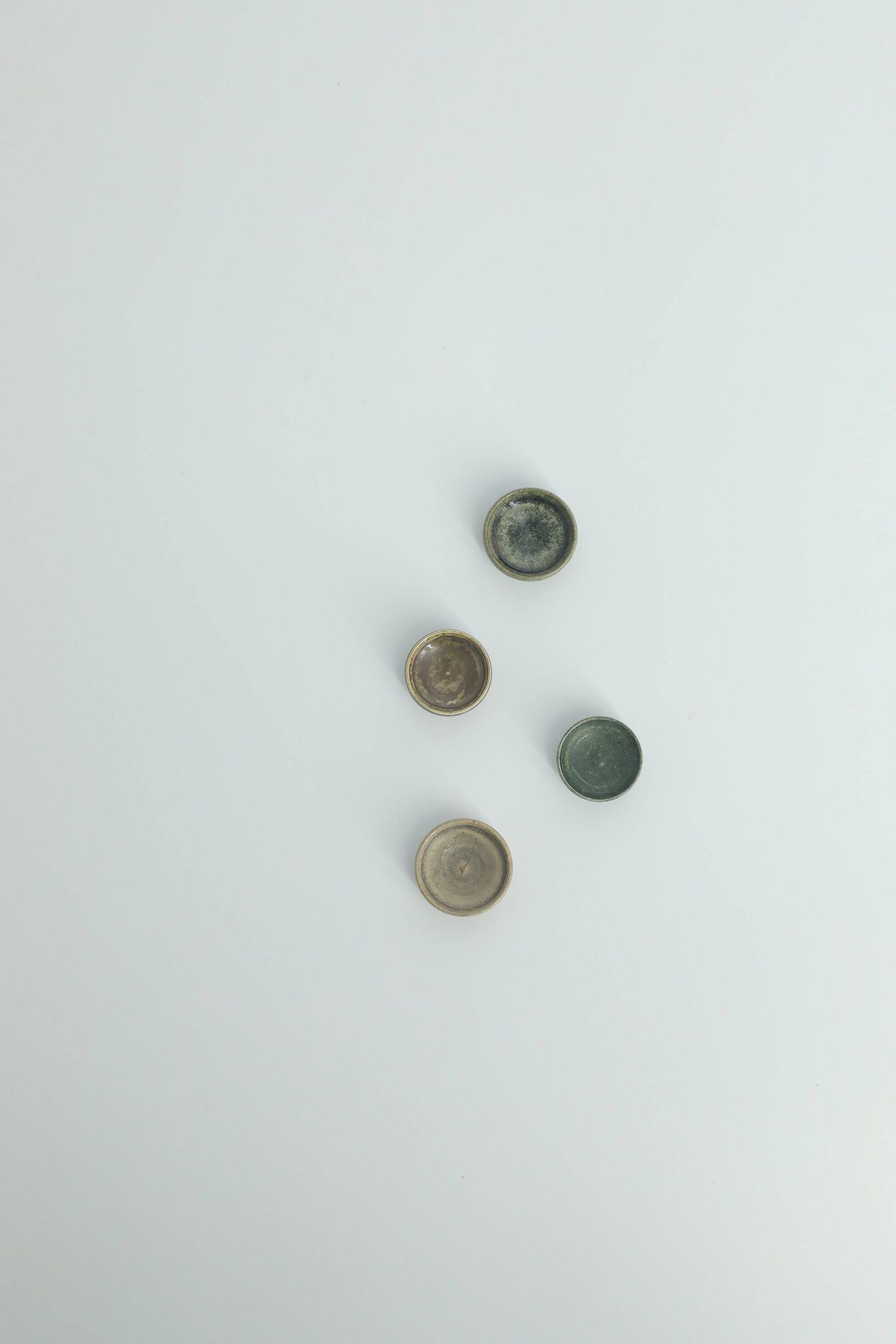 Set of 4 Scandinavian collection bowls in brown and green stoneware, mid-20th century.