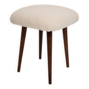 Set of two mid-century modern light beige boucle stools, Europe, 1960s.