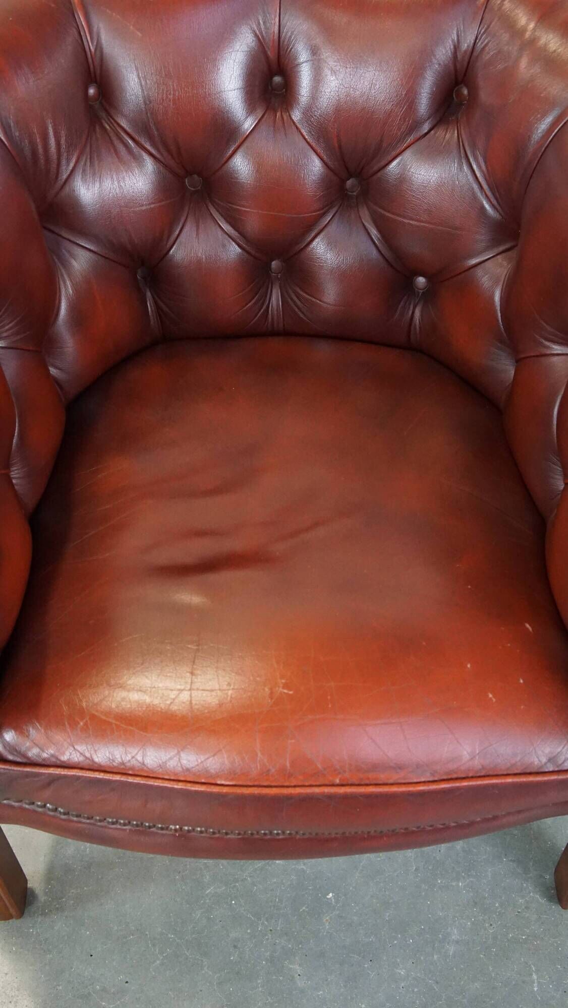 Red cow leather English chesterfield club chair