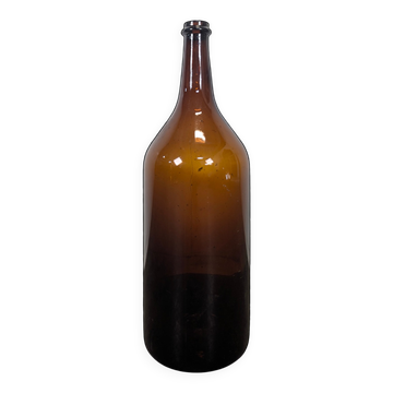 Large antique blown amber glass bottle