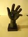Statuette la main