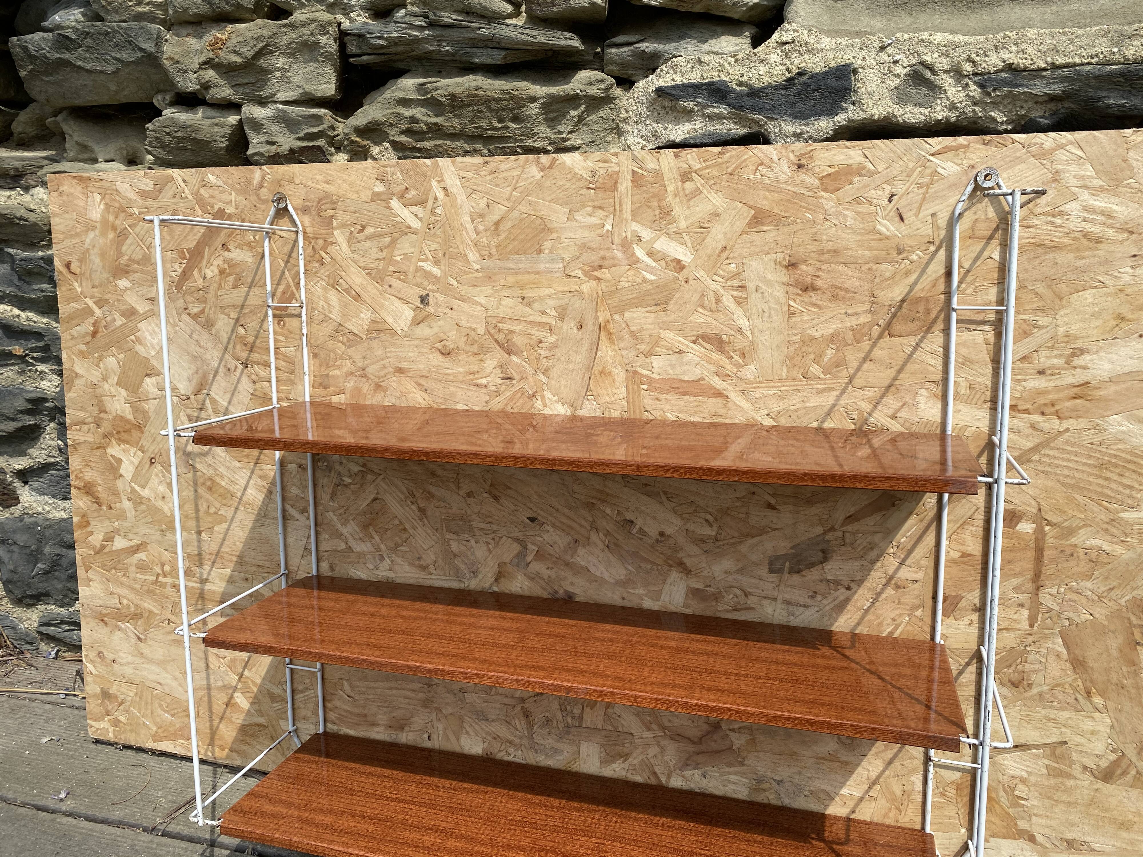 Metal wall shelf