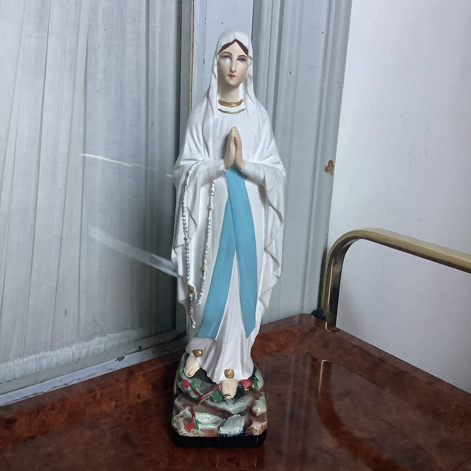 Small plaster statue of the Virgin Mary