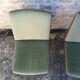 Shell chairs and green fabric