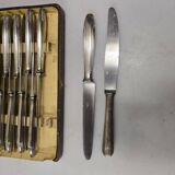 12 silver-plated knives from the mid-20th century