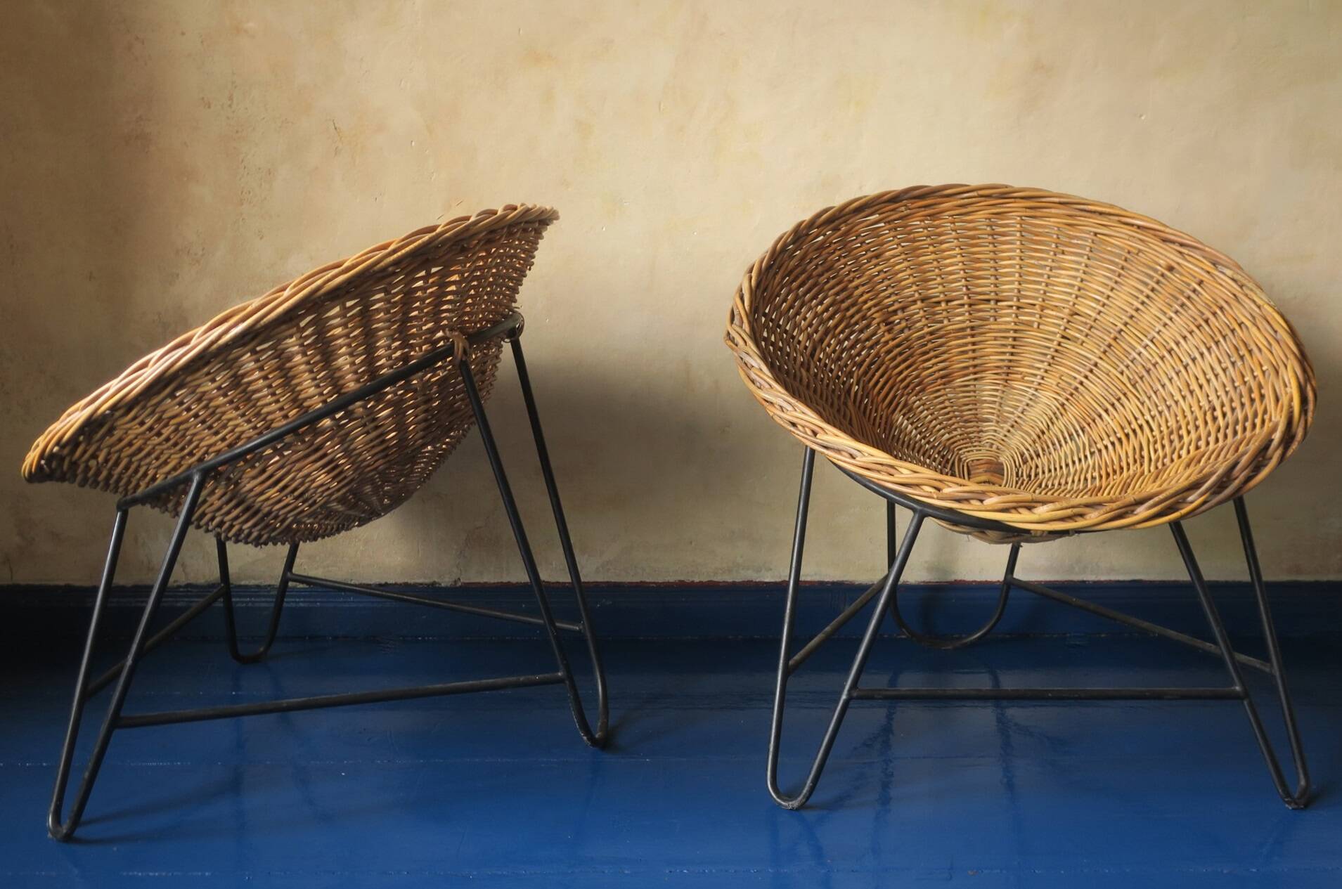 Pair of mid century bamboo and iron pod chairs, 1960s