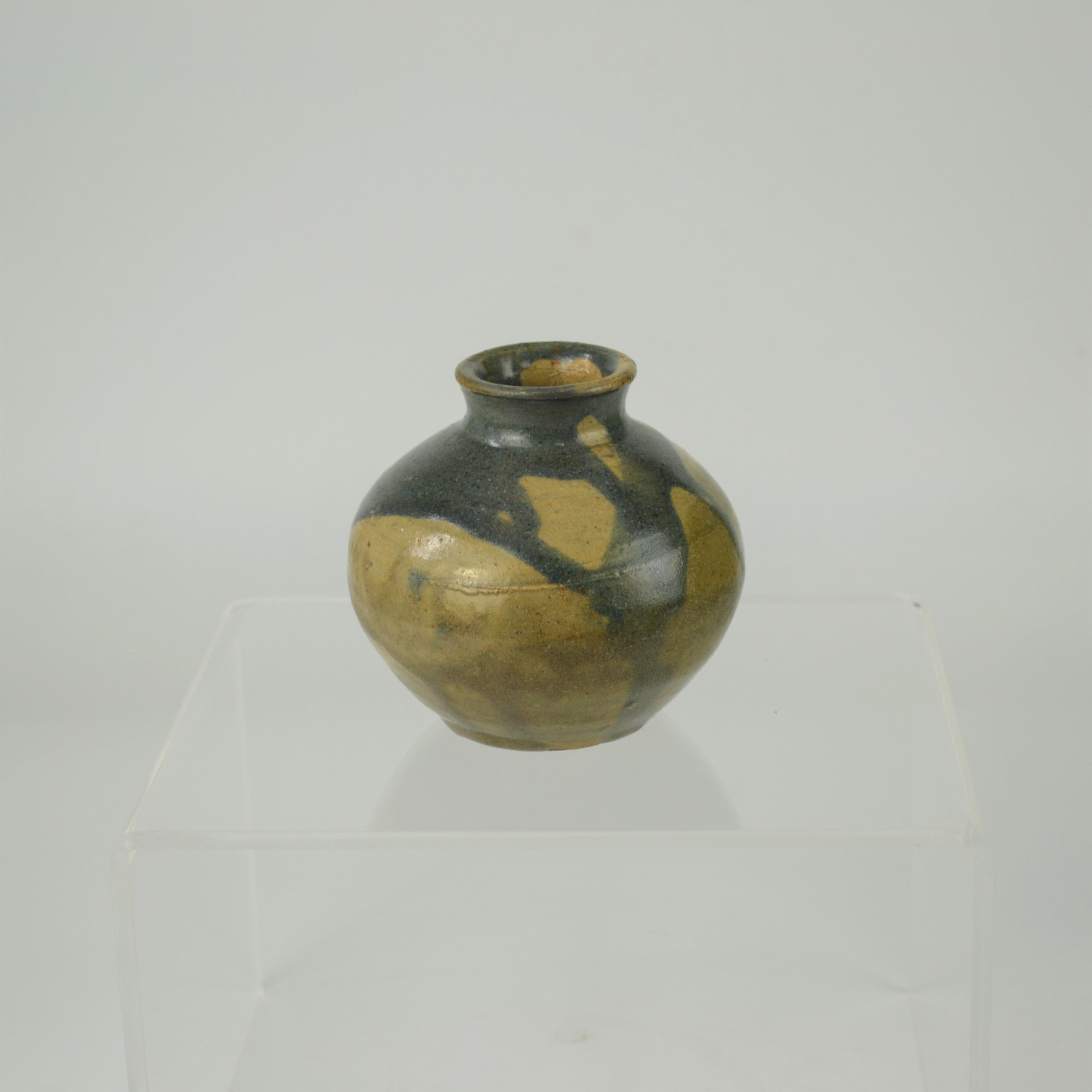 Sandstone ball vase by Eugène Lion