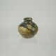 Sandstone ball vase by Eugène Lion