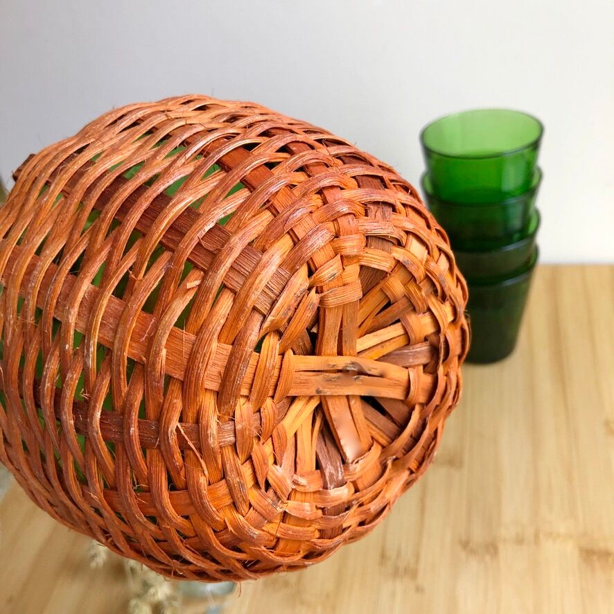Service carafe and vintage glasses, with wicker