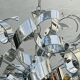 Sculptural chrome suspension design