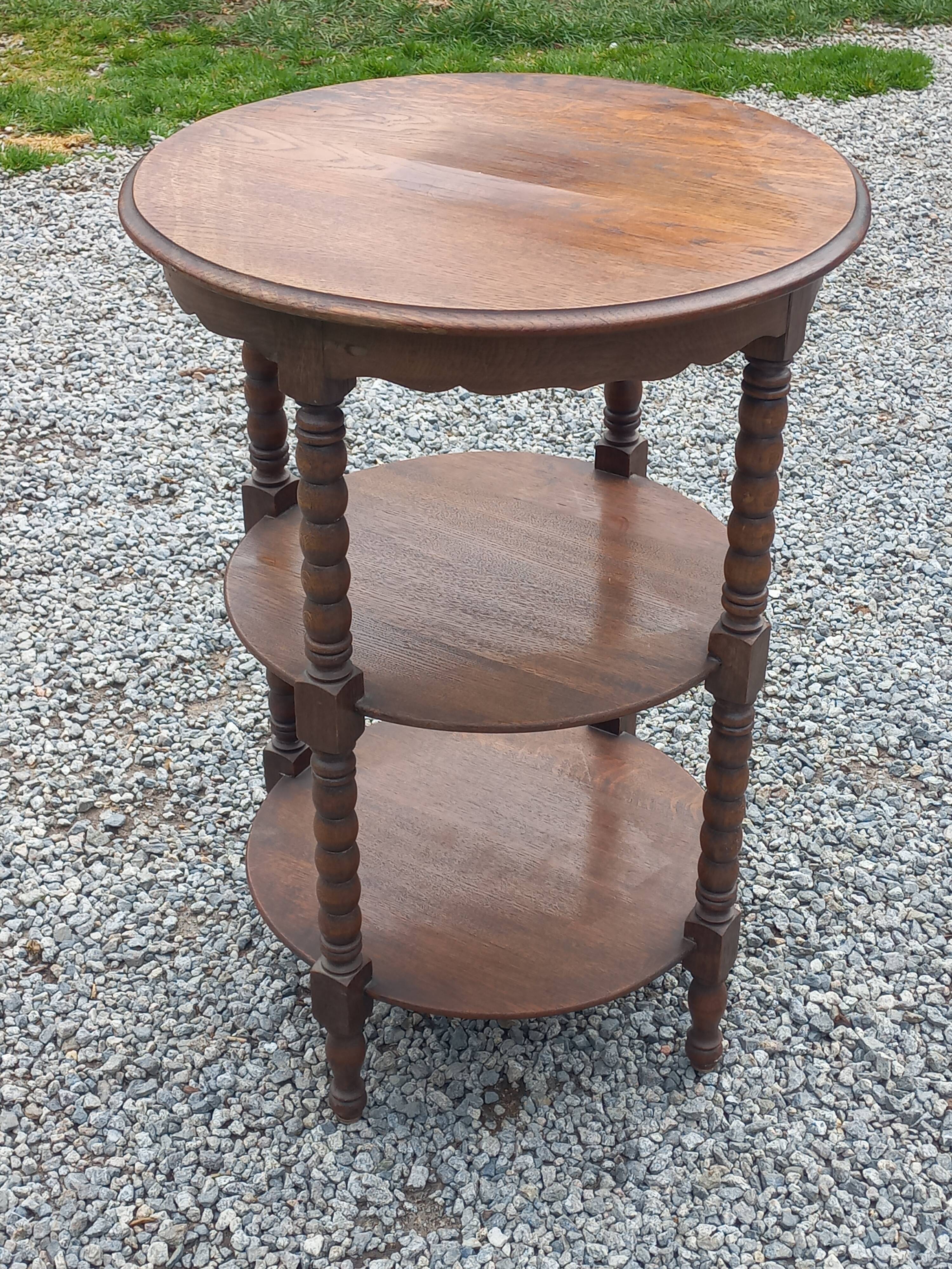 Vintage oak pedestal table with 3 shelves from the 60s
