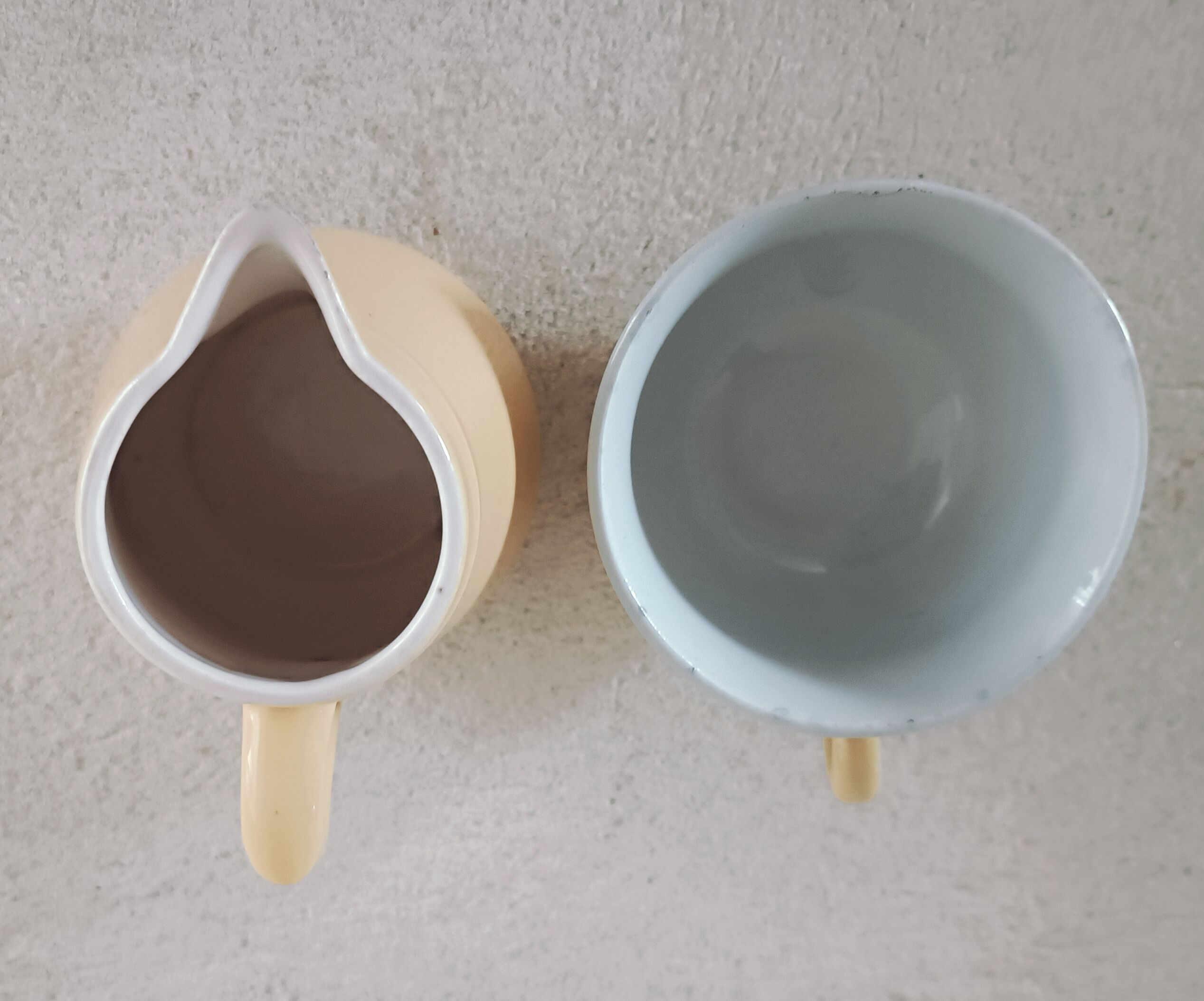 Earthenware cup and milk jar