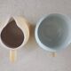 Earthenware cup and milk jar