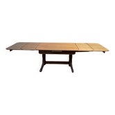 Oak dining table with integrated extensions