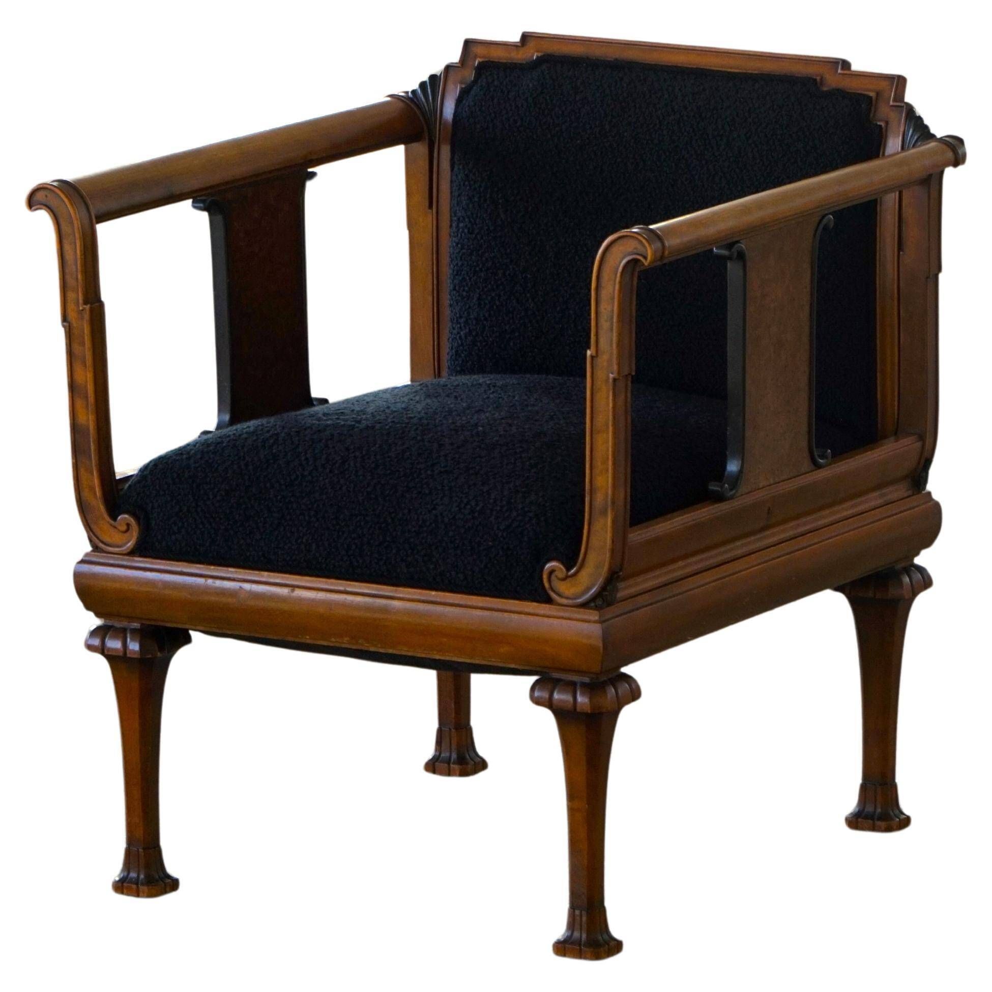 Early 20th century Danish Art Nouveau armchair, reupholstered in charcoal boucle.