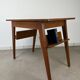 Compass leg desk, 1950s wood reconstitution style.