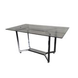 Chromed metal table with smoked glass top