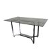 Table en métal chromé dessus verre fumé