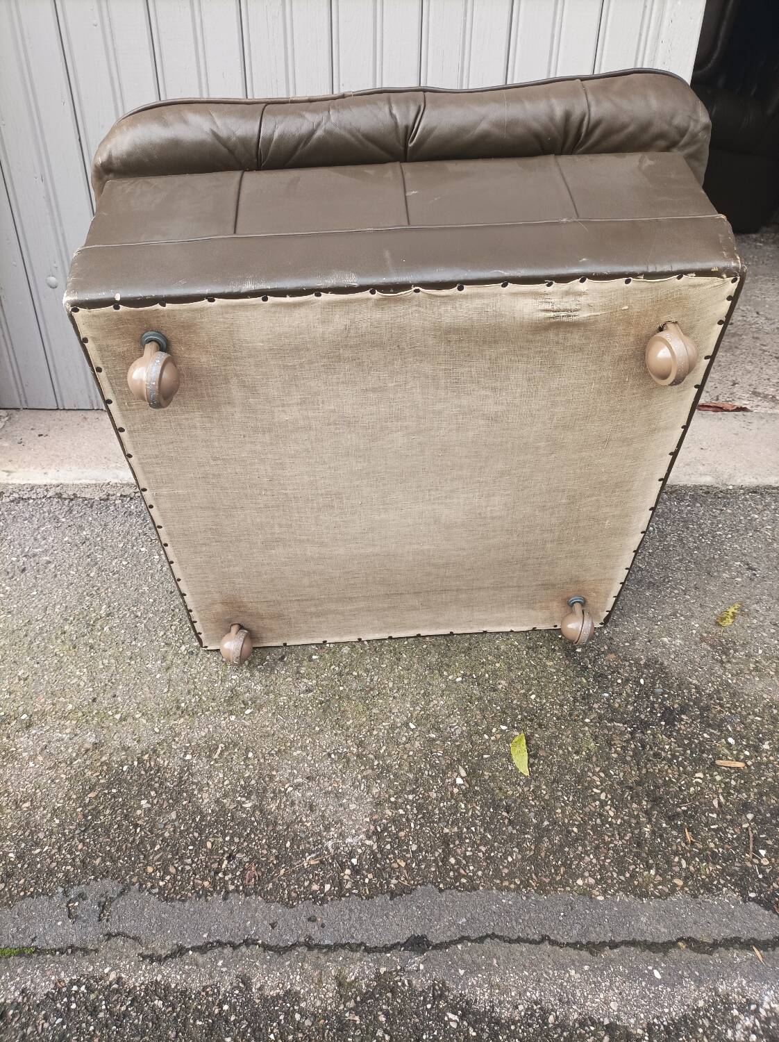 Pair of Chesterfield armchairs with footrest