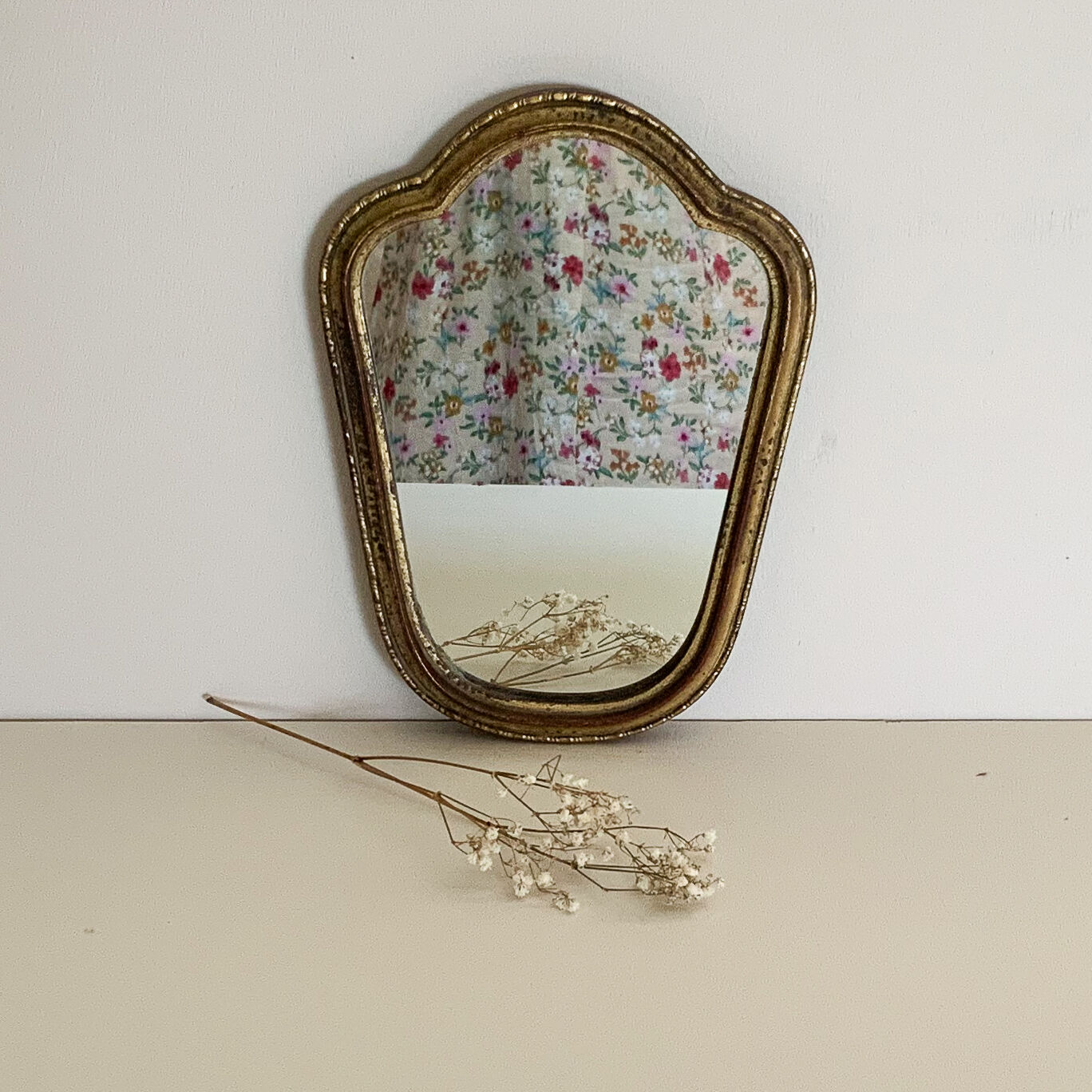Small gilded wooden mirror