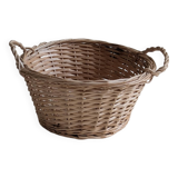 Round wicker basket in light wood