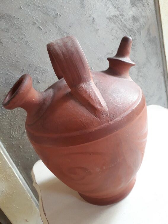 Old jar in terra cotta