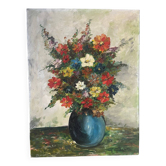 Bouquet de fleurs dans un vase bleu, signé